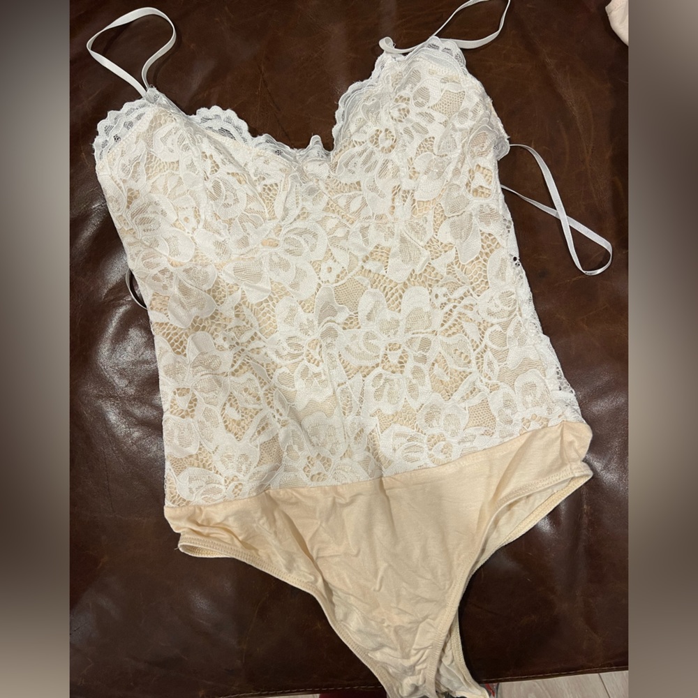 Brand New with tags. Lulus Bodysuit